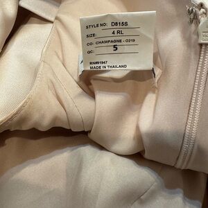 Alfred Sung bridesmaids dress, champagne color with belt at waist